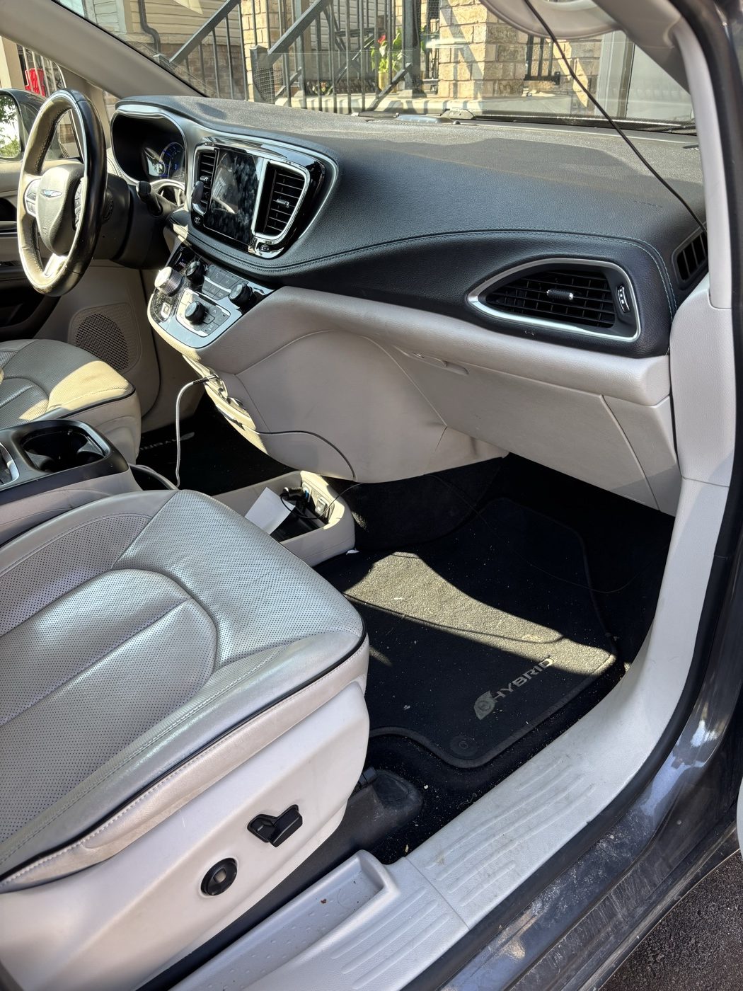 Chrysler minivan front interior before detailing